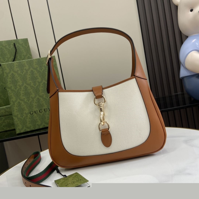 G*u*i top handle bags